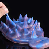 Sapphire Dragon Grinder – C-Punkt- und Klitorisstimulator mit Riemen und Penetrationsloch